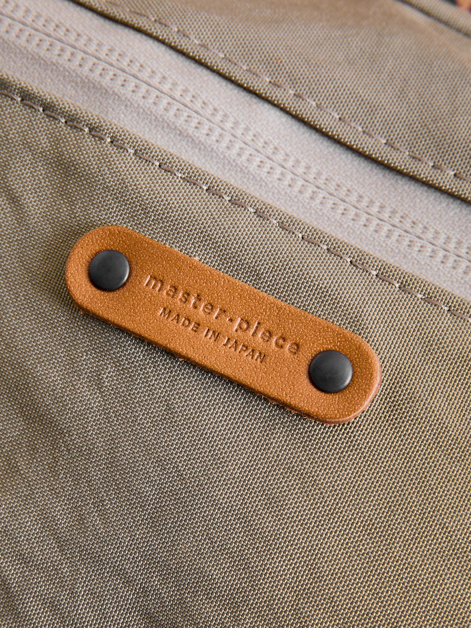 Root Mini Shoulder Bag in Beige - Image 9